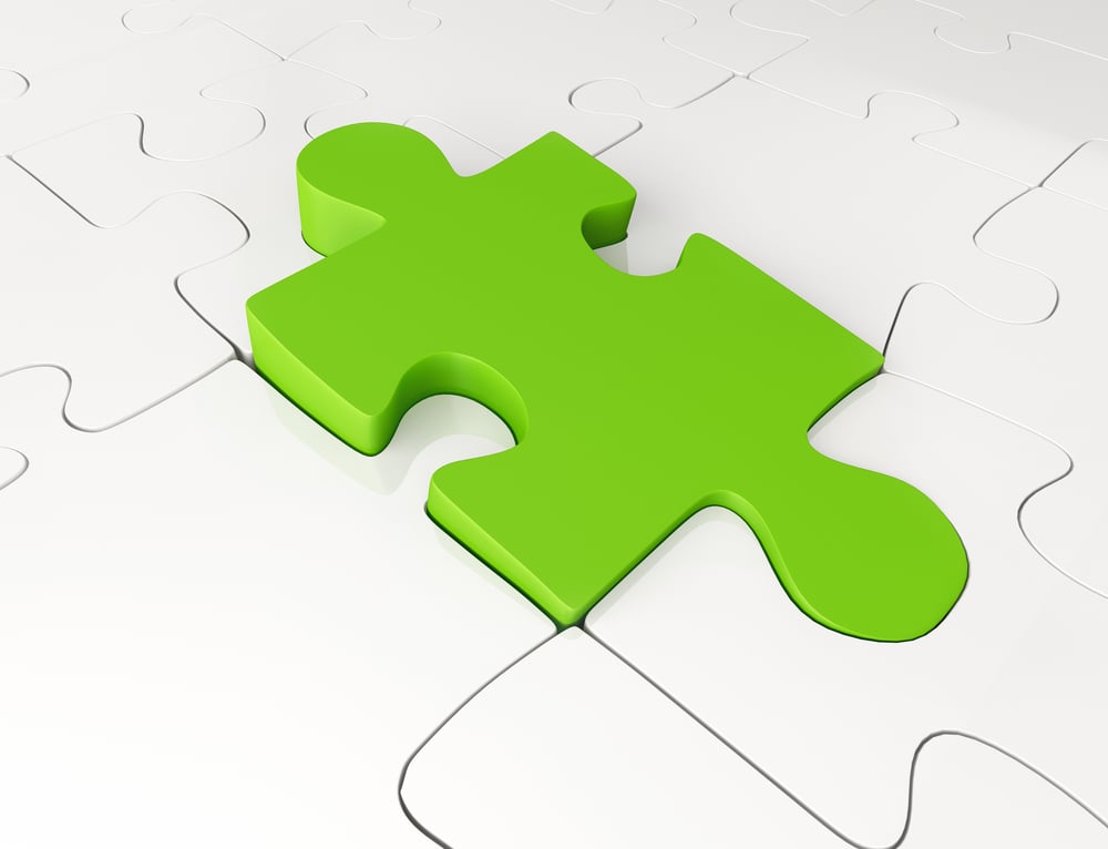 Outstanding green piece in a solved white puzzle Outstanding green piece in a solved white puzzle